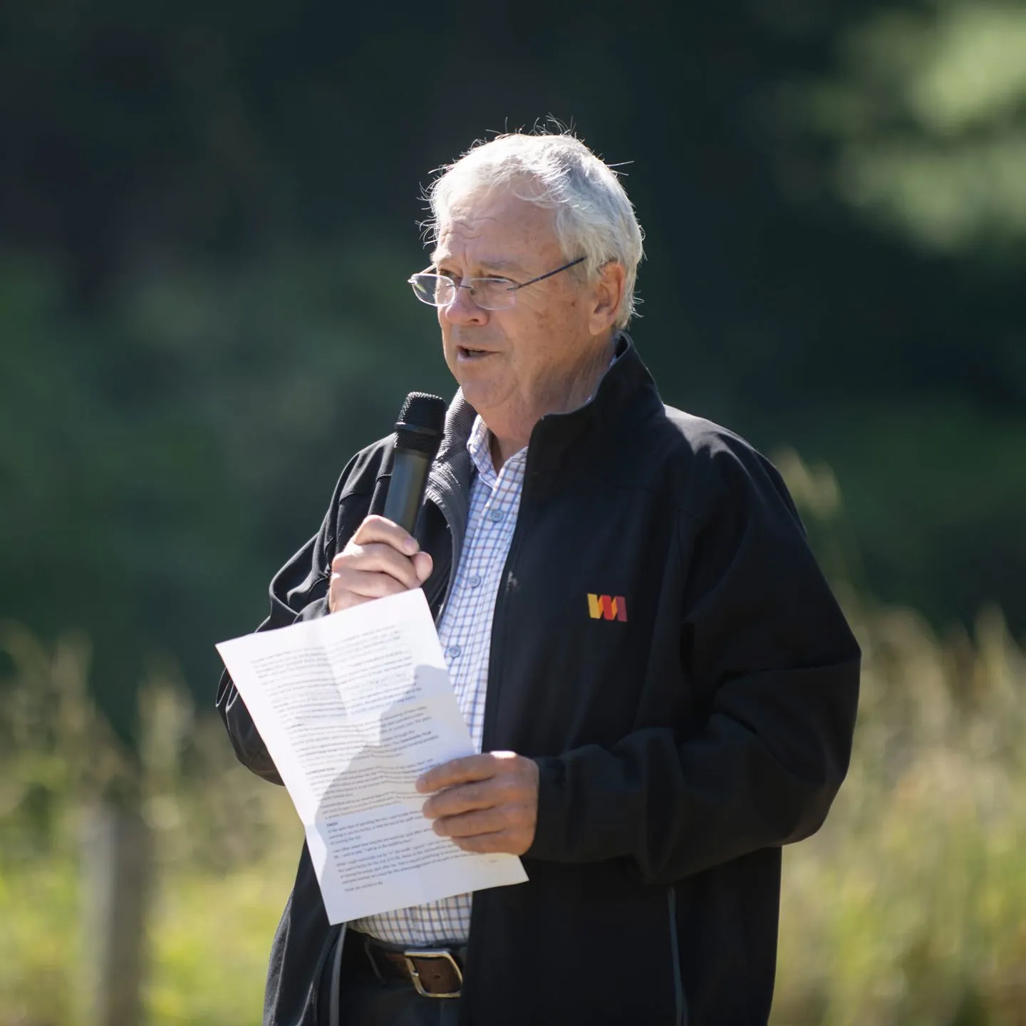 Speaker addressing guests at a Kate Valley event