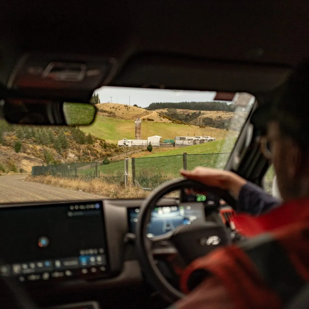 Driver looking out over the landfill from a site vehicle